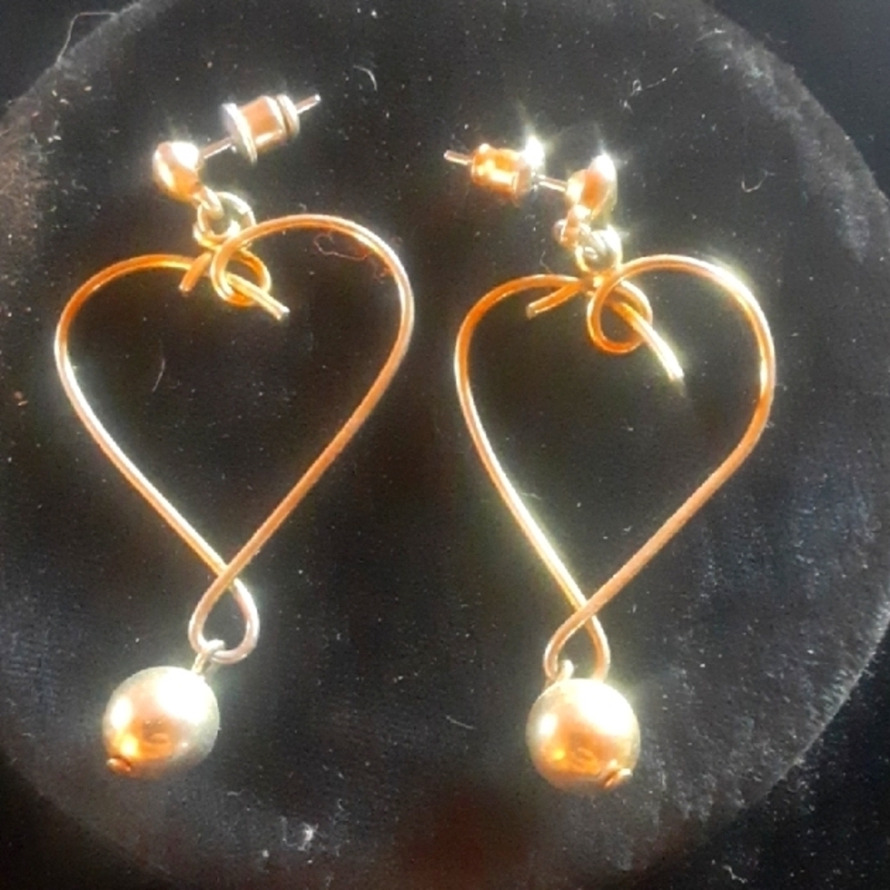 Gold Tone Heart Shaped Dangle Earrings with Whimsical Design